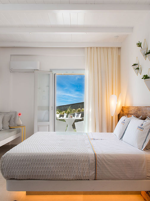 Modern room with double bed in Sifnos