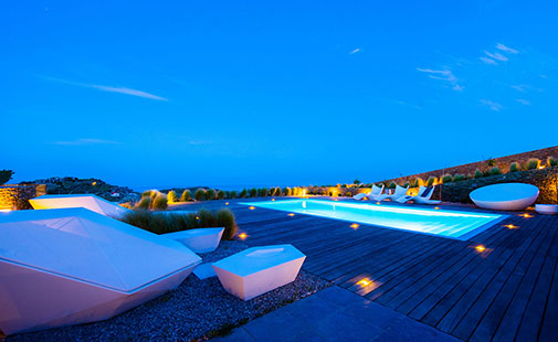 Night photograph of the pool at Elements Sifnos boutique